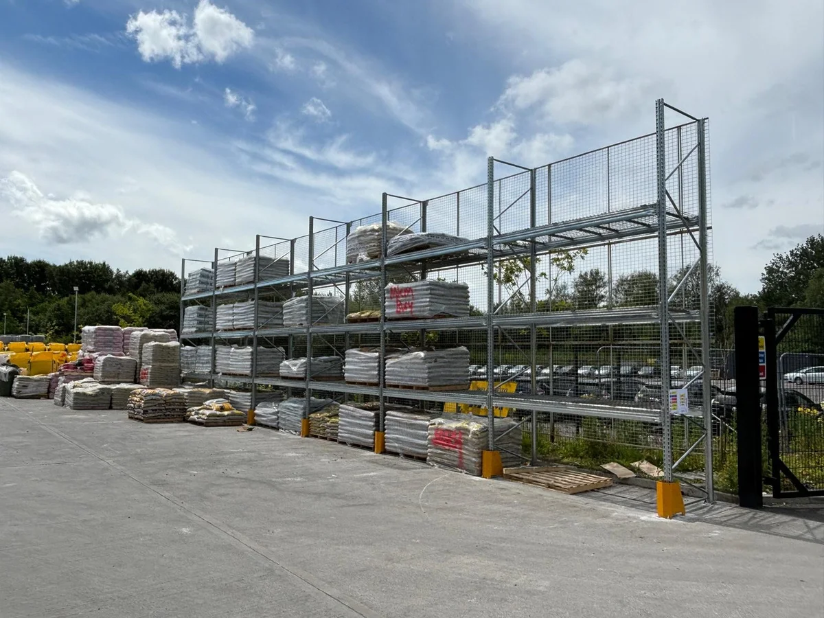 Galvanised racking storing pallets at a builders’ merchant